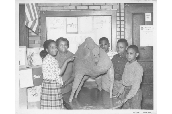 Mrs. Kirkland and students at Howe School on W. Bowery, eliminated to build the Innerbelt. (Photo courtesy of The University of Akron Archival Services)